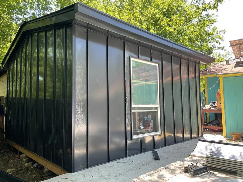 Black standing seam metal wall panels for Metal Roof Installation in Putnam