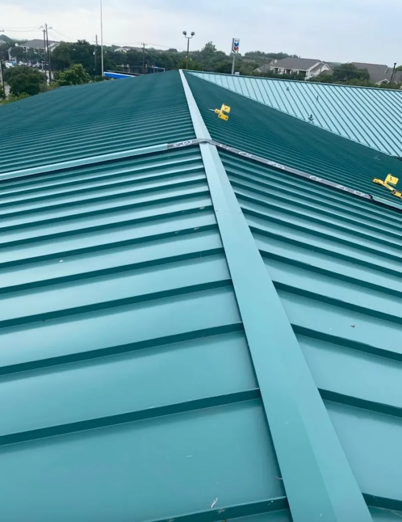 Green commercial metal roof ridge and valley for Metal Roof Repair in Putnam